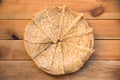 Top view of crepes french pancakes folded in circle, on wood background