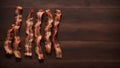 Top View of Crispy Bacon Strips on a Wooden Table, Copy Space