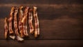 Top View of Crispy Bacon Strips on a Wooden Table, Copy Space