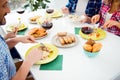 Top view cropped portrait of festive relatives imposing food in