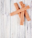 top view crunchy sticks on the right with copy space on white wooden background