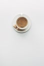 top view of cup of aromatic coffee with saucer and brown sugar Royalty Free Stock Photo
