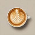 Top View of a Cup of Cappuccino Featuring Beautiful Latte Art on a Creamy Surface Royalty Free Stock Photo
