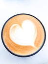 Top of view a cup of cappucino with shape love Royalty Free Stock Photo