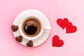 Top View of Cup of Coffee grains with heart shaped chocolate cookies and red paper hearts. Valentines day concept Royalty Free Stock Photo