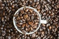 Top view of a cup filled with coffee beans Royalty Free Stock Photo