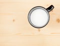 Top of view of a cup of milk on wood table, concept of breakfast Royalty Free Stock Photo