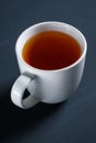 Top view cup of tea on black wooden table Royalty Free Stock Photo