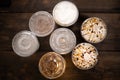 Top view of cups with cold drinks on wood background-concept of sweets