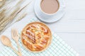 Top view danish pastries and coffee cup on white wooden table