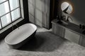 Top view of dark bathroom interior with bathtub and window with city view Royalty Free Stock Photo