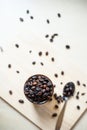 Top view of dark roasted coffee bean in antique cup Royalty Free Stock Photo