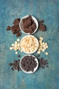 Top view of dark and white chocolate drops or morsels and chunk Royalty Free Stock Photo