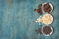 Top view of dark and white chocolate drops or morsels and chunk Royalty Free Stock Photo