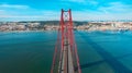 Top view of the 25 De Abril Bridge. Red bridge in Lisbon.Portugal sightseeing Royalty Free Stock Photo