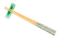 Top view of decorated chopsticks on chopstick rest Royalty Free Stock Photo