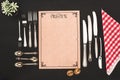 top view of decorative blank menu and vintage cutlery