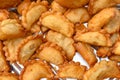 Top view deep fried traditional Chinese Yau Kok Zai or sweet dumpling