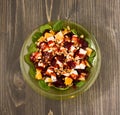 Top view of a delicious beet salad with oranges and feta