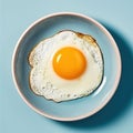 Top view of a delicious breakfast with a fried egg featuring a yellow yolk Royalty Free Stock Photo
