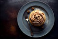 Top view of delicious cinnamon bun on plate as dessert.generative ai