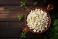 Top view of delicious freshly prepared popcorn in a frying pan on a rustic wooden table Royalty Free Stock Photo