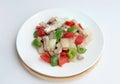 Stir fried pork with sweet peppers, onion and black pepper on white plate. Royalty Free Stock Photo