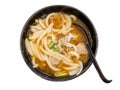 Udon Noodle Soup and Pork with spoon on white background Royalty Free Stock Photo