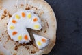 Top view of a delicious lemon drizzle cake with poppy seeds