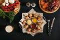 top view of delicious roasted chicken with various sauces, assorted meat and vegetables Royalty Free Stock Photo