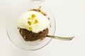 Delicious vanilla and chocolate ice cream in glass bowl with spoon. Royalty Free Stock Photo