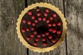 Top view of delicious whole chocolate cake decorated with fresh Royalty Free Stock Photo