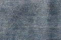 Top view of denim jeans texture. Canvas jeans background of dark blue color with details Royalty Free Stock Photo