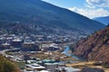 Top view of the densely packed dwellings down the hill in the valley of Thimphu