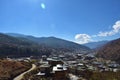 Top view of the densely packed dwellings down the hill in the valley of Thimphu