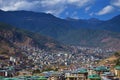 Top view of the densely packed dwellings down the hill in the valley of Thimphu