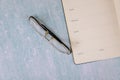 Top view with desk on lined notebook of reading glasses Royalty Free Stock Photo