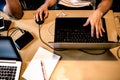 Top view of detail work space with young a man typing