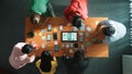 Top view of developer team working together to write idea on note. Convocation. Royalty Free Stock Photo