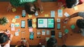 Top view of developer team working together to write idea on note. Convocation. Royalty Free Stock Photo