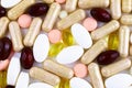 Top view of different medical pills and nutritional supplements texture close up. Royalty Free Stock Photo