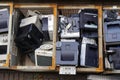 Top view of different outdated and old electronic devices, now electronic waste, modern society