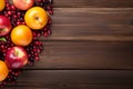 Top view different ripe juicy red yellow apples pomegranate seeds on rustic wooden table background. Healthy fruits