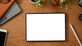 Top view, Digital tablet mockup on wooden table background Royalty Free Stock Photo