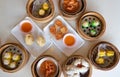 Top view of dim sum set, many plate, Shumai Siu Mai shrimp & pork Chinese steamed dumplings, deep fried taro dumpling Royalty Free Stock Photo