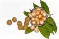 Top view of Dimocarpus longan.A bunch of Longan fruits with green leaves on white isolated background Royalty Free Stock Photo