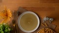 Top view of dinning table with mock up plate, silverware on placemat and ingredients flower vase decorated