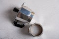 Top view of the disassembled geyser coffee maker on a light background Royalty Free Stock Photo