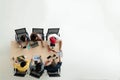 Top view of diverse people of creative team group using smartphone, mobile phone, tablet and computer laptop. Royalty Free Stock Photo