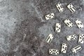 Top view of domino tiles on marble stone background